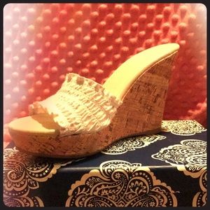 White ruffled wedges